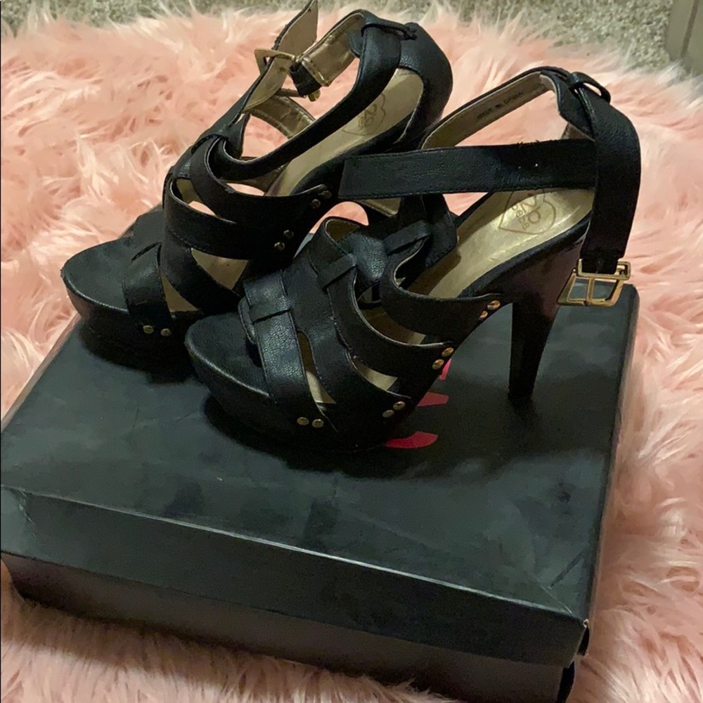 black BEBE pumps